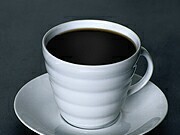Drinking three to five cups of coffee a day may reduce the risk of developing coronary atherosclerosis