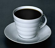 Drinking three to five cups of coffee a day may reduce the risk of developing coronary atherosclerosis