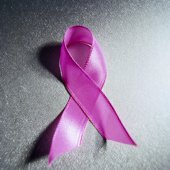 Scientists say they have identified two new genetic variants that are associated with an increased risk of breast cancer. Their findings are published online Feb. 4 in <i>Human Molecular Genetics</i>.