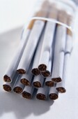 A gene variation associated with smoking longer and getting lung cancer at a younger age has been identified by researchers. The study was published in the May issue of the <i>Journal of the National Cancer Institute</i>.