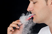 Electronic cigarette use is associated with a decrease in tobacco smoke toxicant exposure in those who quit smoking
