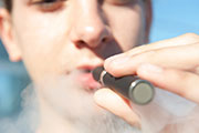 Electronic cigarette (e-cig) smoking is associated with a transient decrease in cough reflex sensitivity