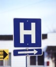 Use of patient navigators as inpatient care facilitators shortens hospital length of stay