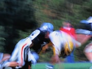 Near point of convergence values change in response to subconcussive head impacts but begin to normalize over time in high school football players