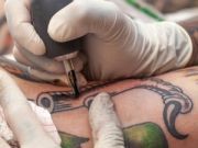 Picosecond-Domain Laser Safe for Removing Decorative Tattoos Picosecond-domain Nd:YAG laser incorporating a potassium-titanyl-phosphate frequency-doubling crystal is safe and effective for removing decorative tattoos