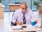 Predictors of Return to Work After Severe Stroke Identified Aged businessman employee unhappy with excessive work