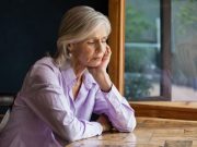 Age-Specific Dementia Risk Scores Developed for Mid, Late Life Sad senior woman sitting at table