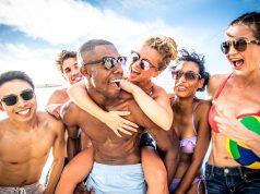 Sun Protection Misinformation Still Common Friends play beach volley